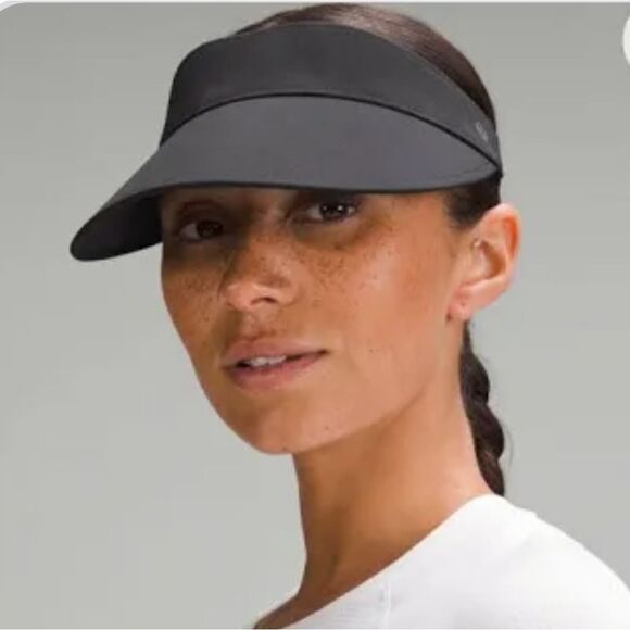 LULULEMON BLACK ADJUSTABLE VISOR NEW WITH OUT TAGS NEVER WORN - Picture 1 of 7